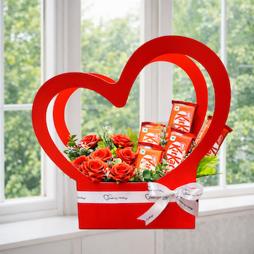 Red heart sleeve with fresh red roses and KitKat chocolates, romantic flower and chocolate gift