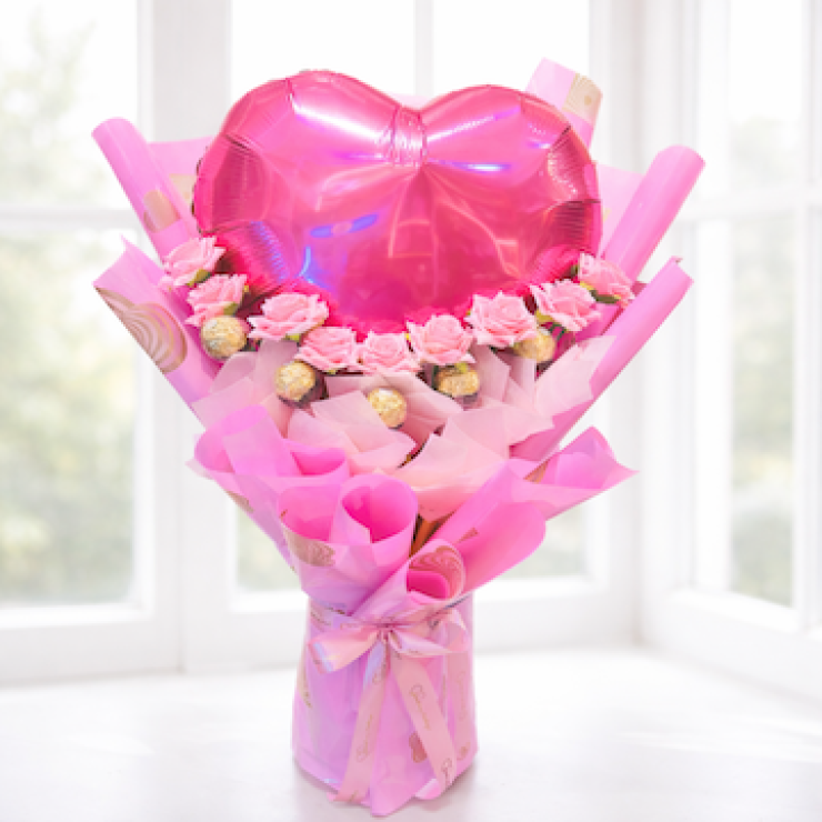 Pink heart foil balloon bouquet with artificial pink roses and Ferrero chocolates, romantic gift arrangement