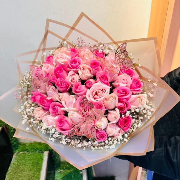 Blush Rose Symphony bouquet with 50 mixed pink and sweet roses in Korean wrapping