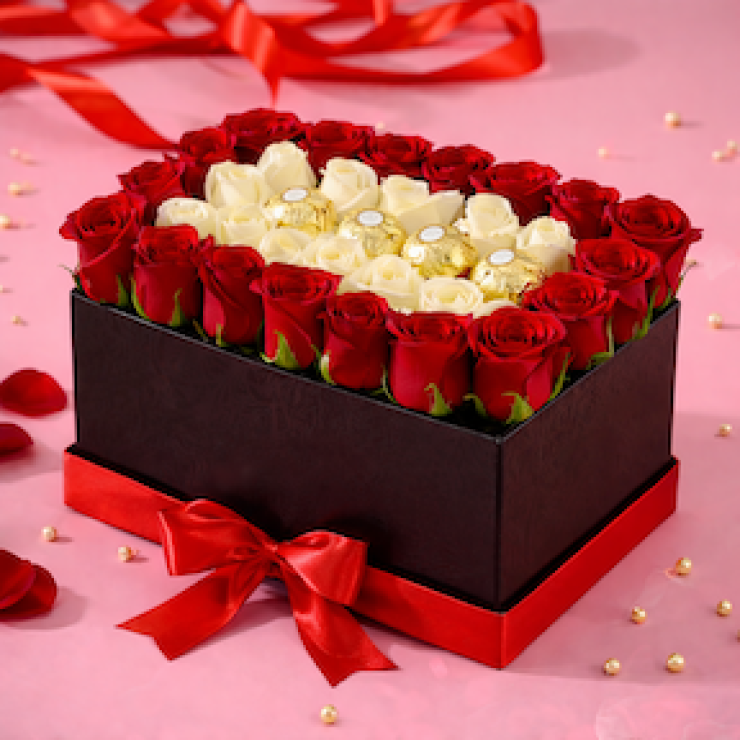 black rectangle box with red and white roses and ferrero rocher chocolates luxury romantic flower gift arrangement