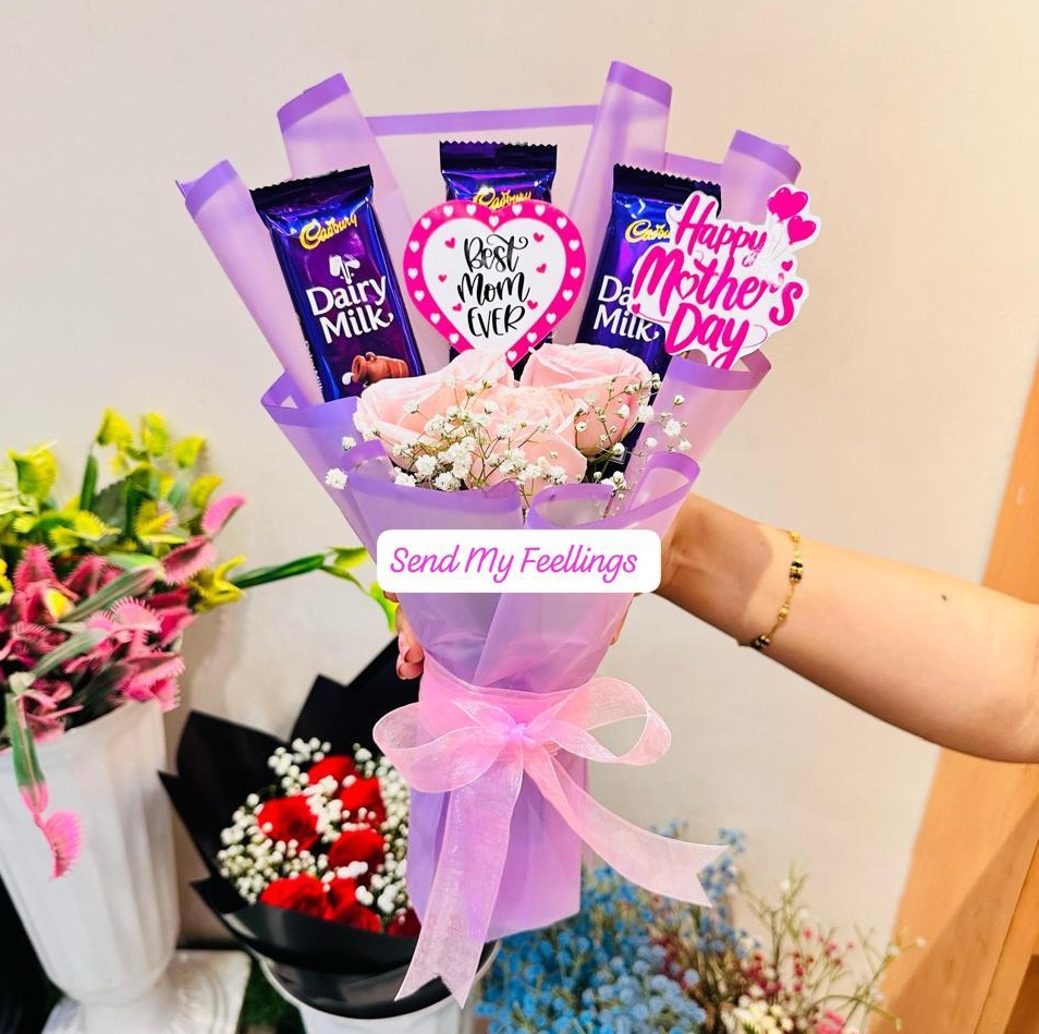 Mother’s Day bouquet with roses and Dairy Milk chocolates in premium wrapping