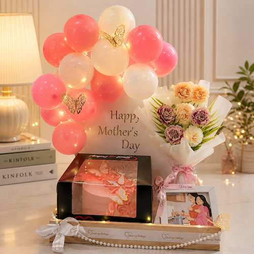 Mother’s Day basket with cake, flowers, balloons, lights and photo frame decor